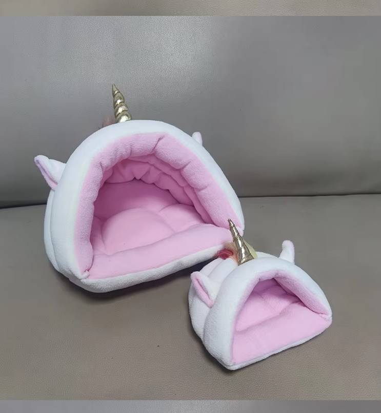 Cozy unicorn pet bed for cats and small dogs. Features a comfortable, plush design for a magical sleep.