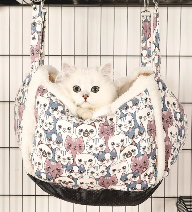 Comfortable plush cat bed, a cozy sleeping basket with a cute pattern; ideal cat gift.