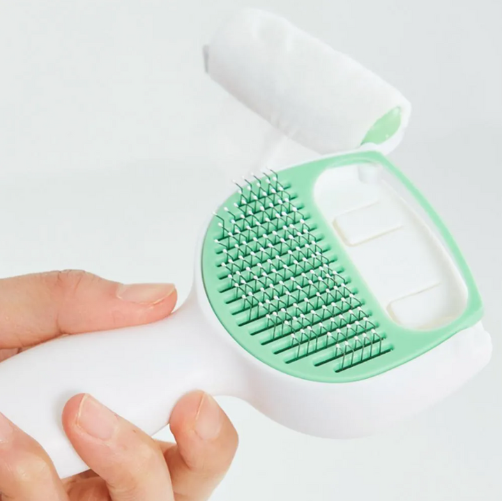Essential self-cleaning pet care grooming tool for healthy cat & dog coats. Reduces shedding effectively.
