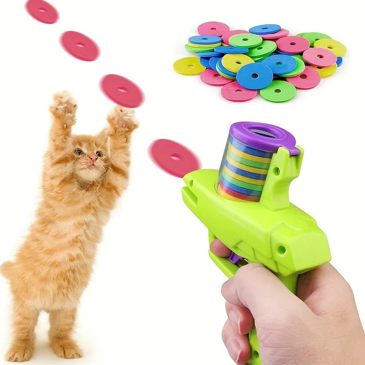 Fun cat activity toy gun, launching discs for pet exercise & engaging indoor feline play.