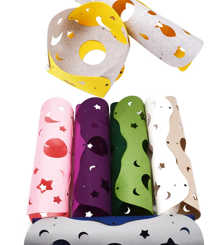 Close-up of a soft felt cat tunnel texture, featuring peek-a-boo holes for engaging pet play.