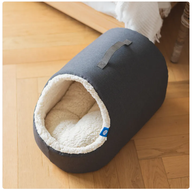Soft cat bed house with plush fluffy edge, offering a private & cozy pet retreat for ultimate feline comfort.