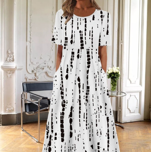 Stylish women's summer midi dress featuring a vibrant floral pattern, comfortable short sleeves & round neck.