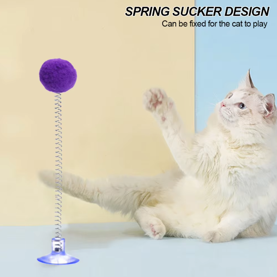 Vibrant cat toy with a durable suction cup base and flexible spring-action shuttlecock for playful felines.
