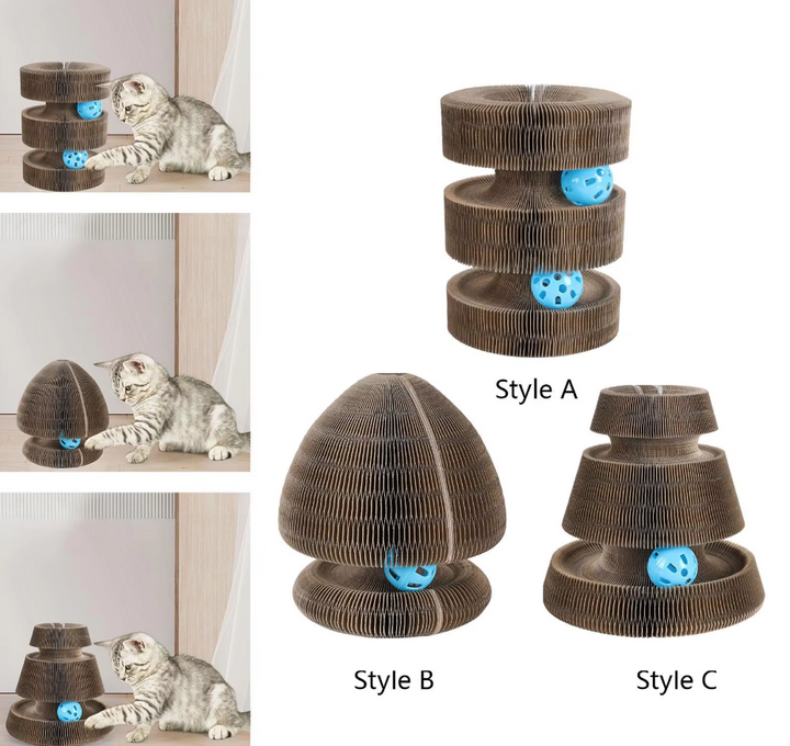 Playful cat batting at the rolling ball on a multi-level interactive scratch tower. Cardboard scratcher.