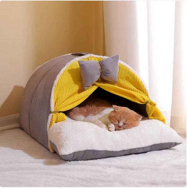 Elegant arch cat house featuring a decorative bow. A comfortable and stylish pet furniture piece for any cat.