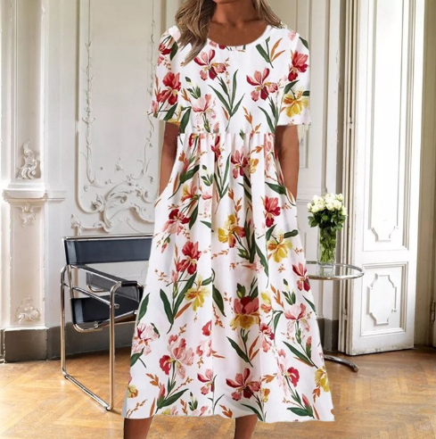 Women's elegant floral midi dress with short sleeves and a classic round neck. Perfect for summer casual wear.