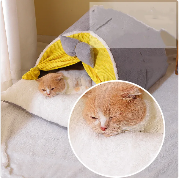 Plush arch cat bed with a charming bow accent. Offers a cozy, private feline retreat for rest and relaxation.