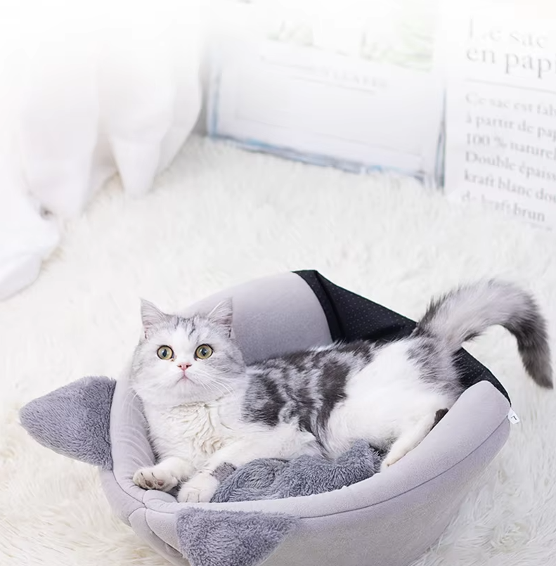 Soft warming black cat bed with a removable cushion, providing a cuddly house for your feline friend. [[lstfy-media:5]]