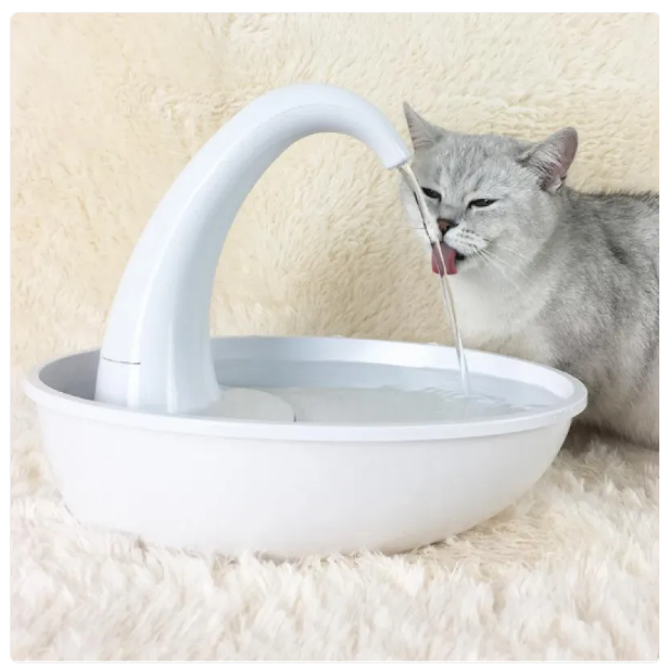 Sleek automatic cat and dog drinking fountain. Provides fresh, filtered water for optimal pet hydration & health.