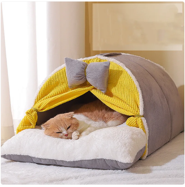 Comfy arch cat house pet bed with a lovely bow design. Ideal pet furniture for feline comfort and a warm retreat.