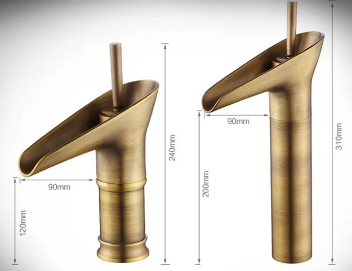 Brushed brass waterfall basin mixer, low profile for a minimalist bathroom look.