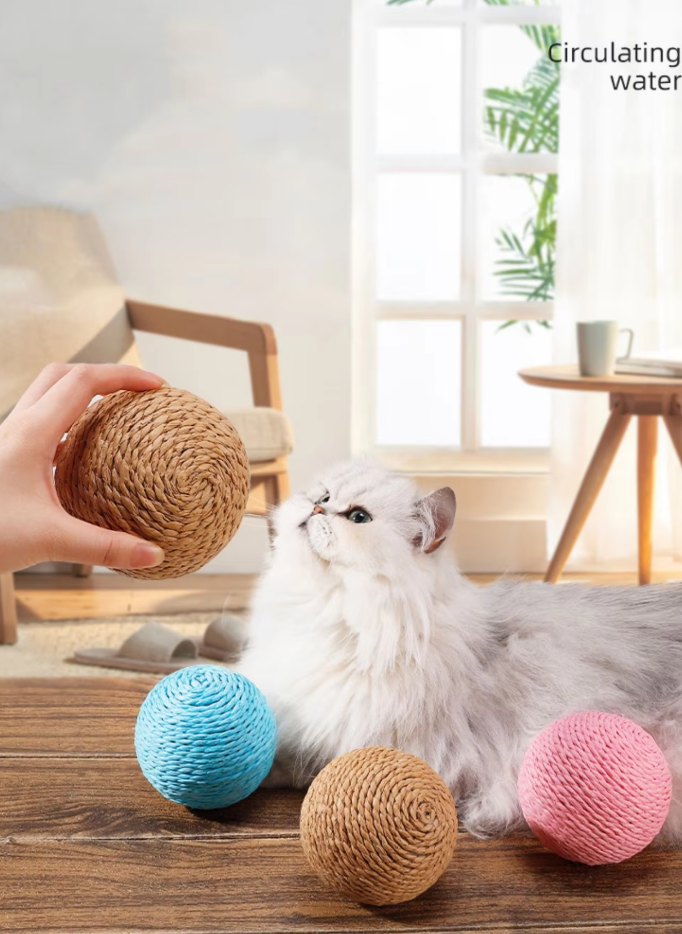 Enriching natural sisal play ball, a cat toy designed for scratching & optimal claw care.