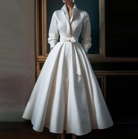 Women's elegant white long maxi dress, ideal for special events, formal evenings & parties. Flattering, timeless style.