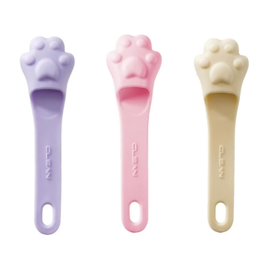 Essential pet grooming: paw-shaped dog tongue scraper for fresh breath, clean teeth & oral hygiene.