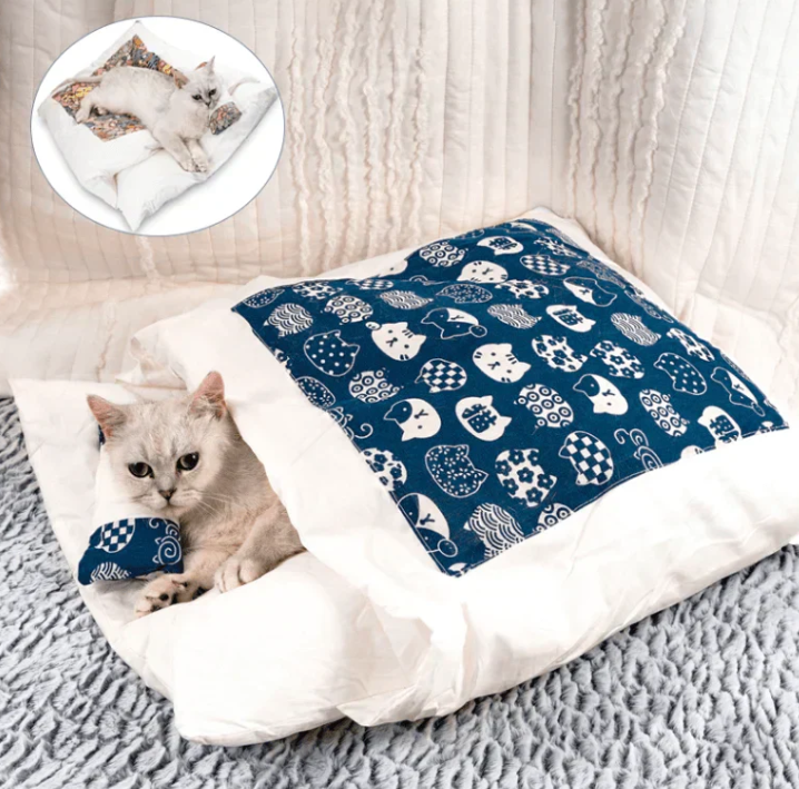 Cozy cat sleeping bag bed for indoor cats, providing warmth & comfort. Washable feline pet supplies.