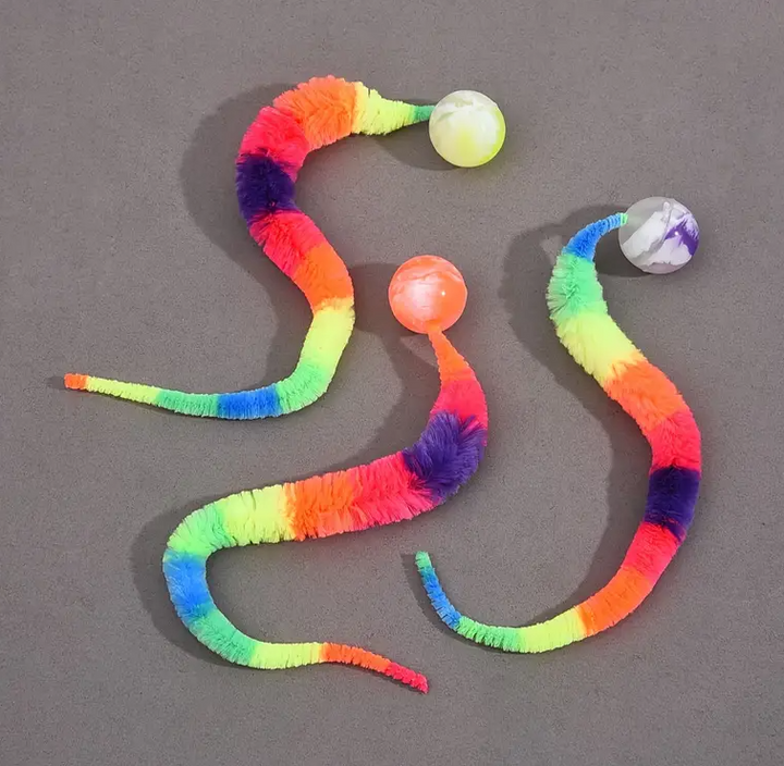 Feline enrichment interactive toy: plush tail & ball designed for active kittens.