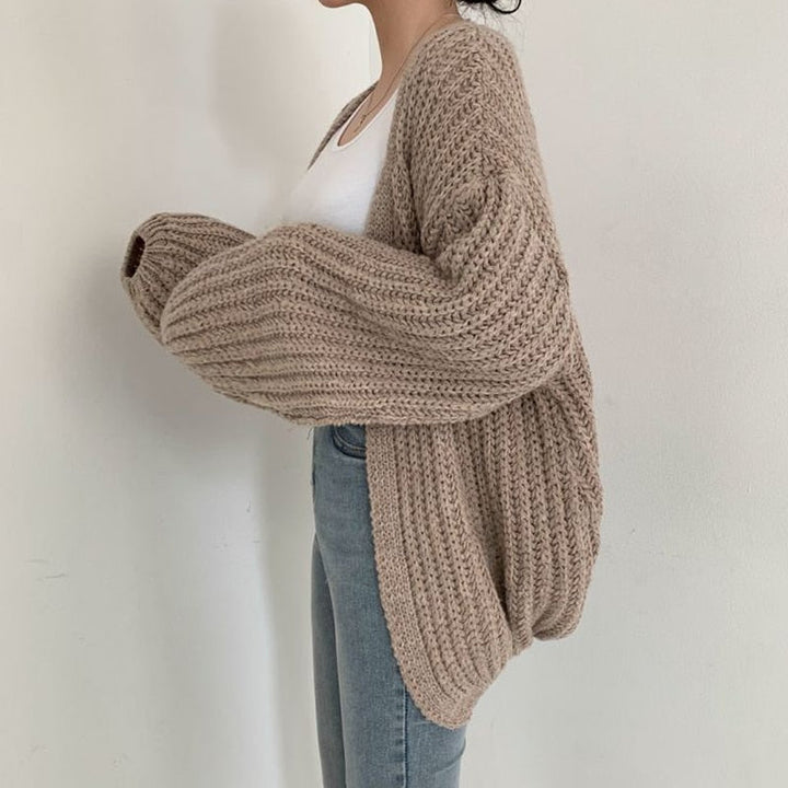 Cozy women's chunky knit open-front cardigan. Relaxed fit, balloon sleeves for fall & winter comfort.