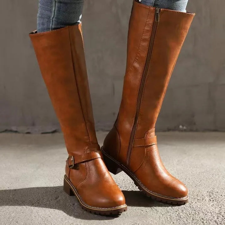 Women's orthopedic tall boots, blending style & comfort. Fashionable footwear for elegant winter outfits.