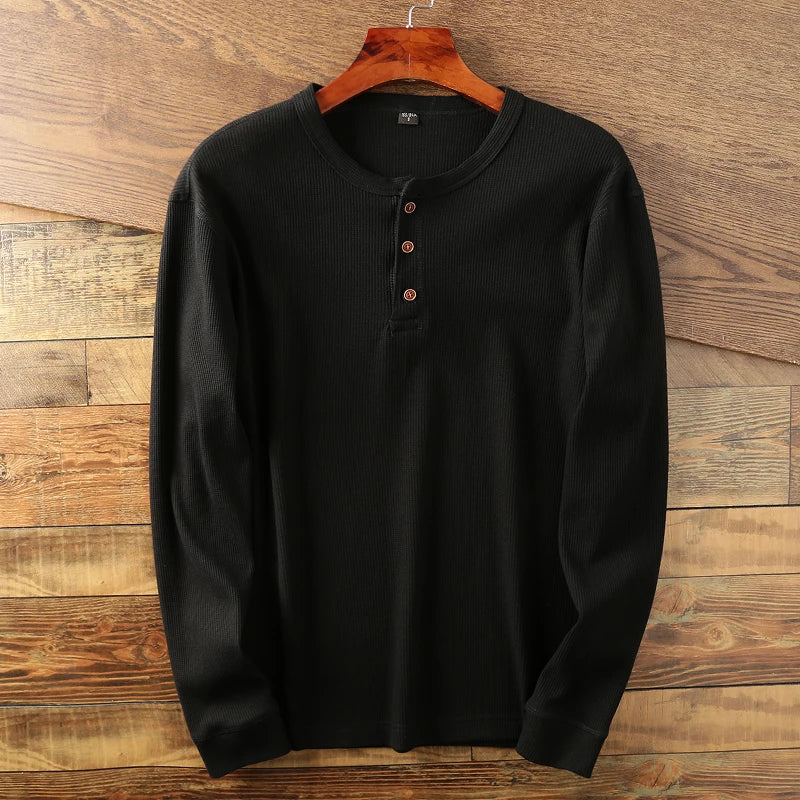 Essential men's long sleeve waffle henley, perfect for a comfortable, minimalist smart casual look.