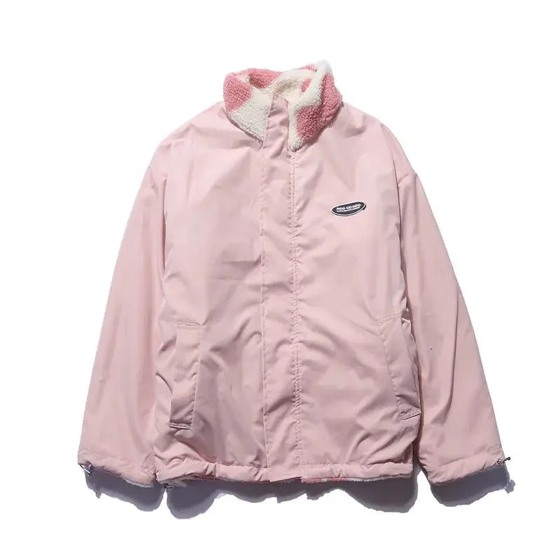 Unique design women's reversible jacket, offering two stylish looks. Features a delightful heart detail.