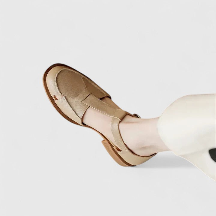 Secure fit women's closed-toe T-strap sandals with a sturdy block heel, perfect for summer comfort.