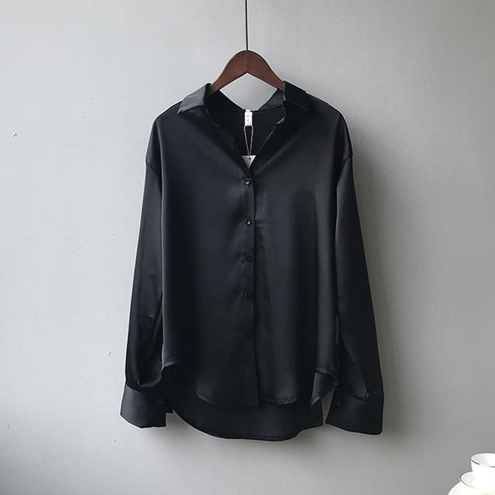 Retro fashion women's elegant long sleeve blouse, a versatile vintage top for chic everyday wear.