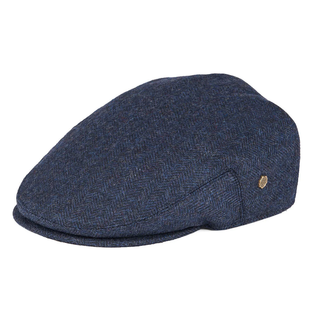 Side profile of a gentleman's herringbone flat cap, emphasizing its elegant shape.
