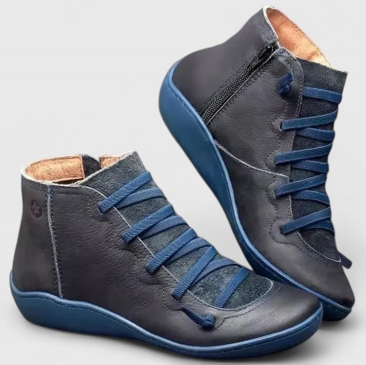 Stylish black orthopaedic boots for women, designed with durable support for walking and ultimate comfort.