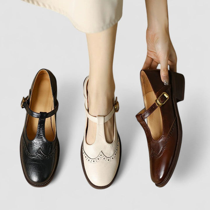 Classic round toe women's Mary Jane shoes, elegant instep strap flats for versatile fashion.