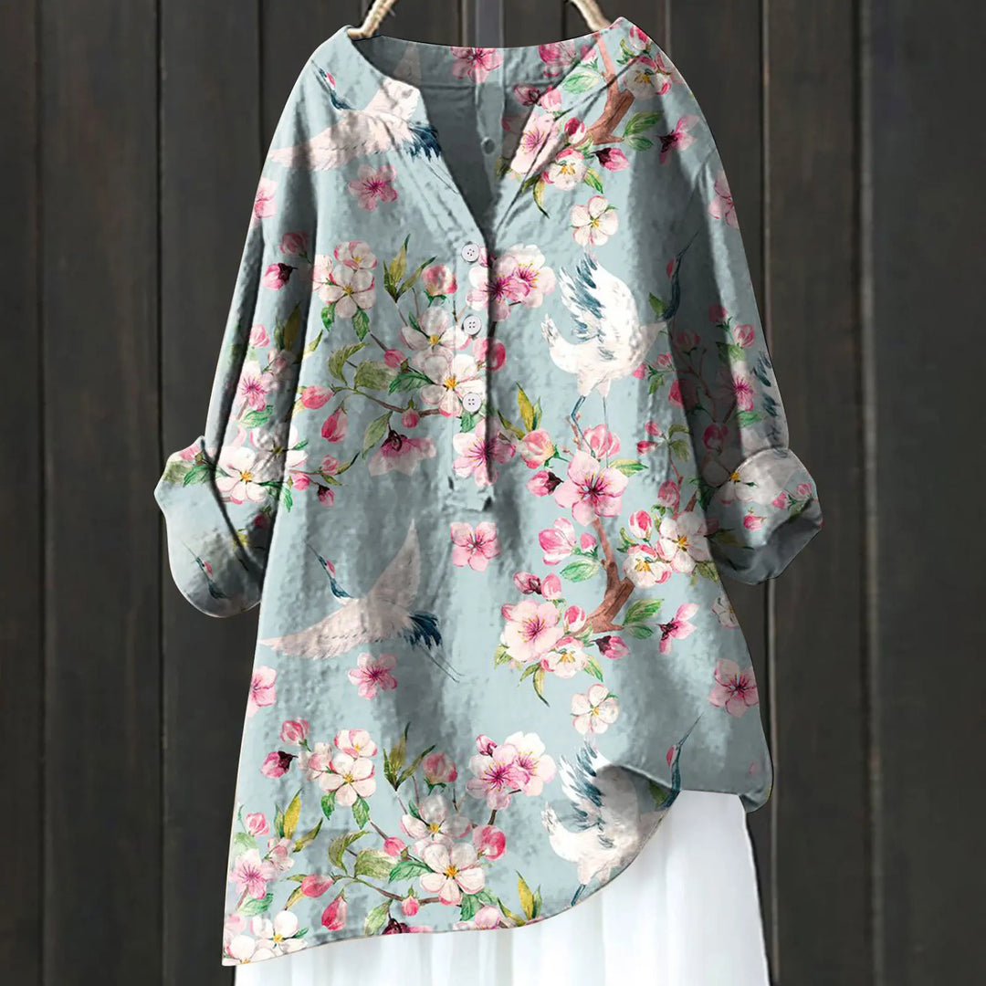 Daily wear women's floral print blouse, a comfortable V-neck top for spring & summer looks.