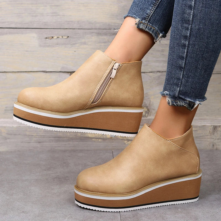 Orthopedic women's fashion ankle boots, delivering comfort & support with elegance.