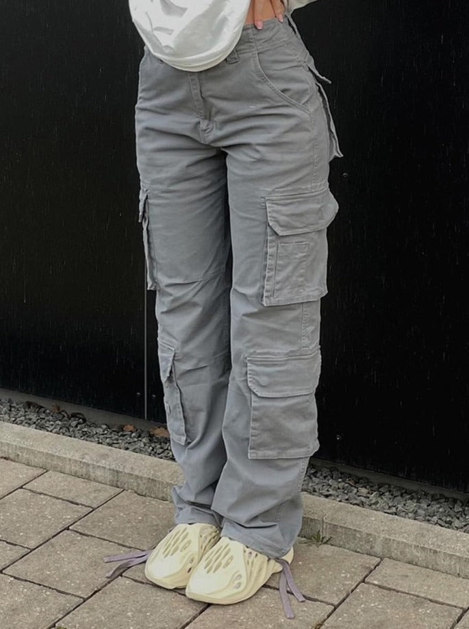 Women's wide leg cargo trousers with utility pockets, perfect for streetwear fashion.