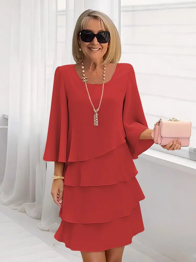 Flattering red ruffle A-line women's dress. Comfortable classic midi style, perfect for elegant summer wear.