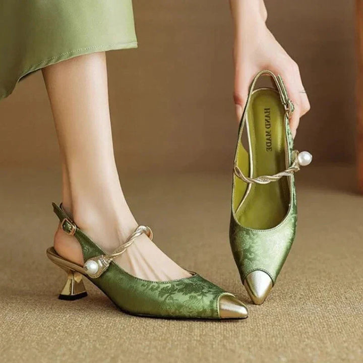 Women's elegant black pointed toe high heels, perfect for formal events & parties.