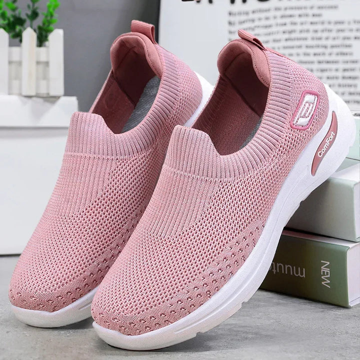 Slip-on orthopedic trainers for women, offering arch support & pain relief for plantar fasciitis & heel spurs.