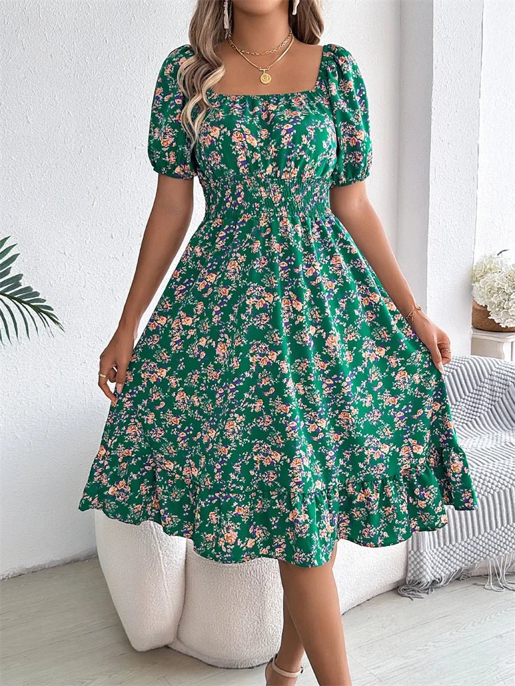 Stylish women's floral midi dress with smocked bodice and fashionable puff sleeves design.