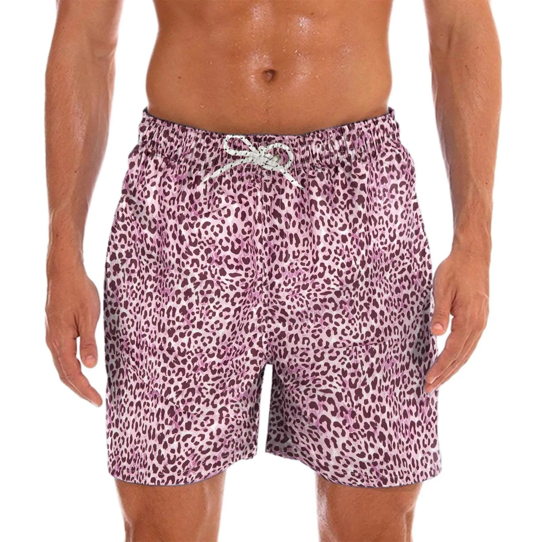 Comfortable men's quick-dry swim shorts with vibrant paisley print, perfect for vacation & resort wear.