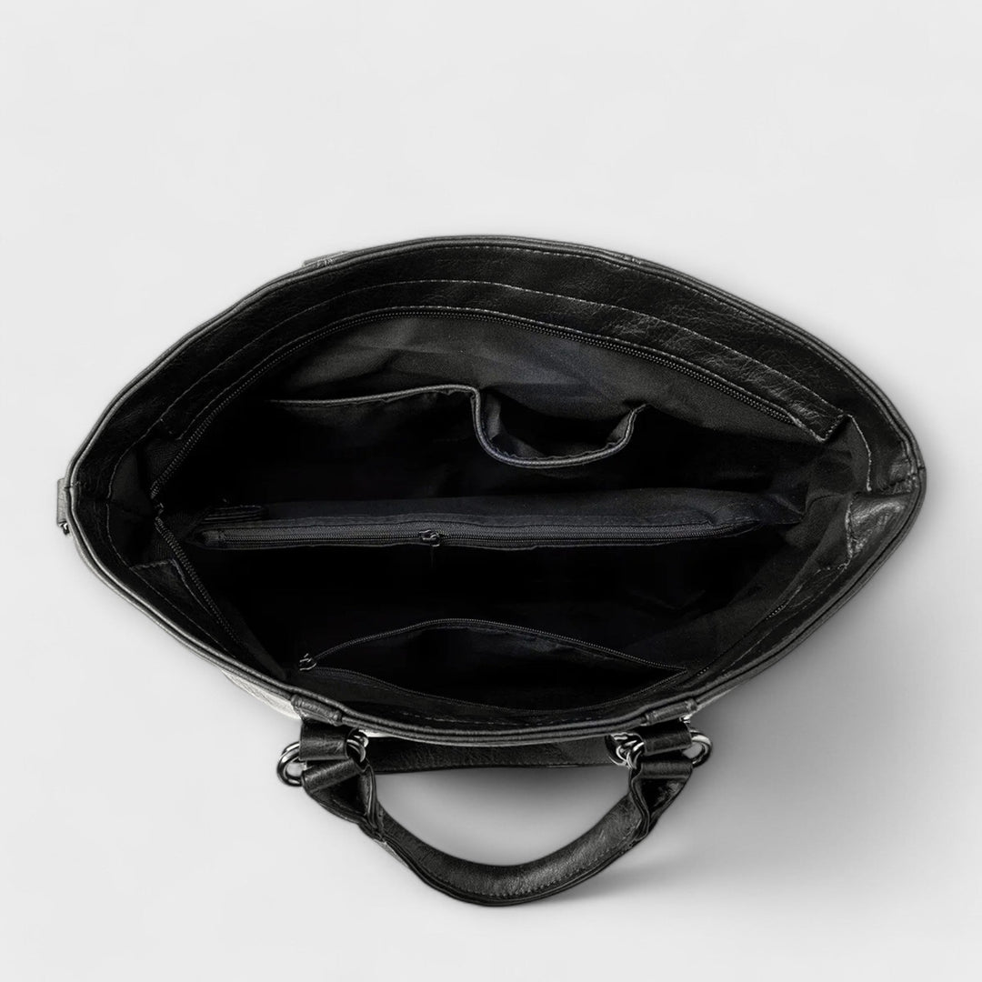 Chic women's large black leather shoulder bag, a timeless handbag for everyday sophistication.