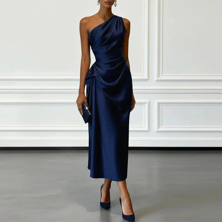 Chic one-shoulder draped midi dress for women. Ruched design creates an elegant silhouette for party wear.