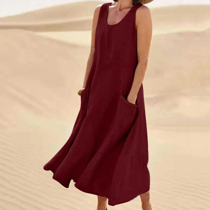 Essential summer women's sleeveless dress, comfortable, with pockets; versatile elegant daily wear.