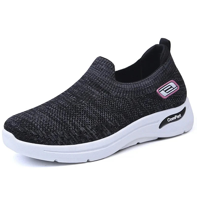 Women's orthopedic slip-on trainers for all-day comfort, ideal for walking and everyday wear.