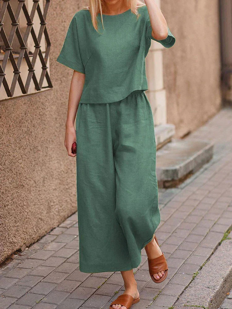 Complete women's linen two-piece set: relaxed fit top and wide-leg pants, a perfect summer casual outfit.
