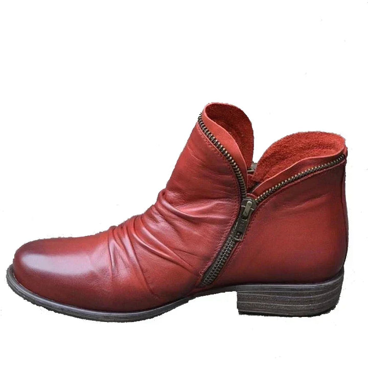 Elegant women's ankle boots with orthopedic design, arch support for healthy & stylish footwear.