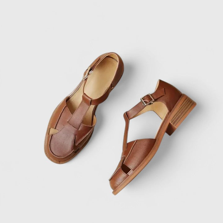 Comfortable women's closed-toe T-strap sandals, ideal for elegant casual summer wear with adjustable strap.