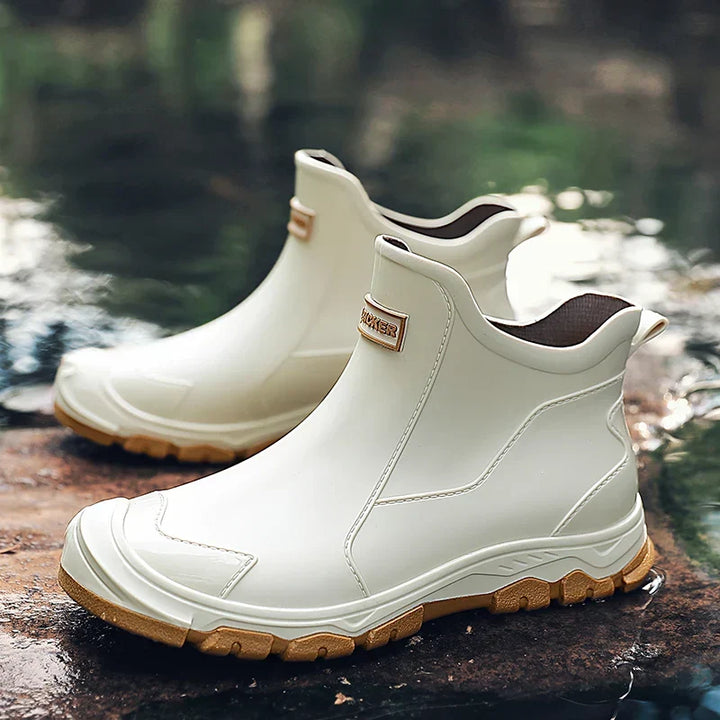 Men's waterproof winter boots. Durable ankle footwear for snow and wet conditions.