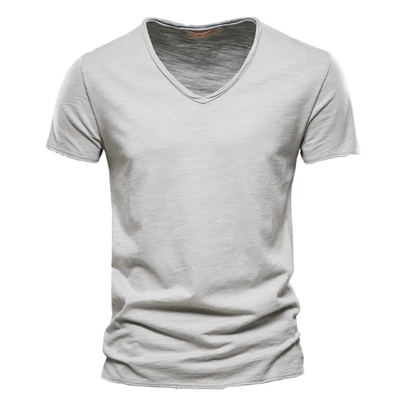 Lightweight, breathable men's V-neck summer shirt. Comfortable, relaxed style, ideal for everyday casual wear.