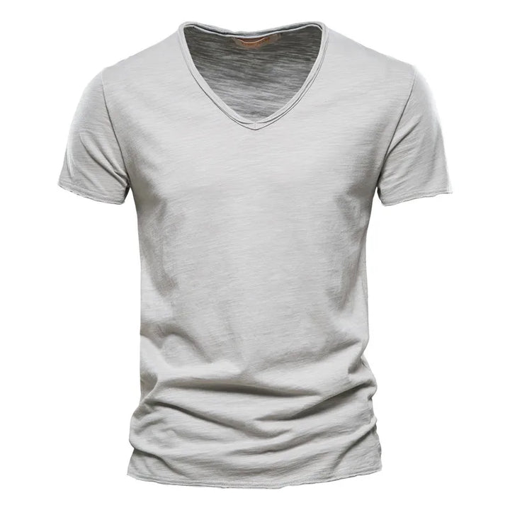 Lightweight, breathable men's V-neck summer shirt. Comfortable, relaxed style, ideal for everyday casual wear.