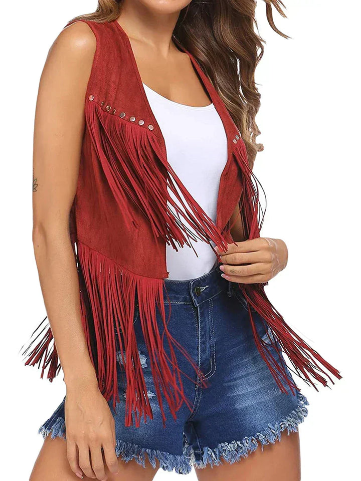 Fashion-forward women's sleeveless vest, open front, studded and fringed for a unique look.