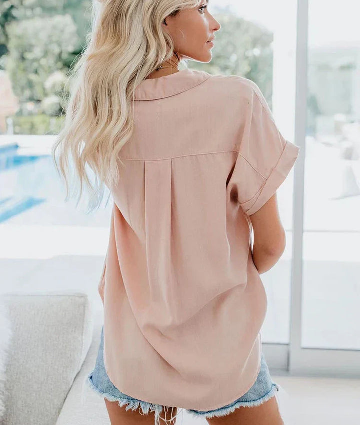 Stylish women's long sleeve button-front blouse with a soft drape, perfect for versatile fashion.